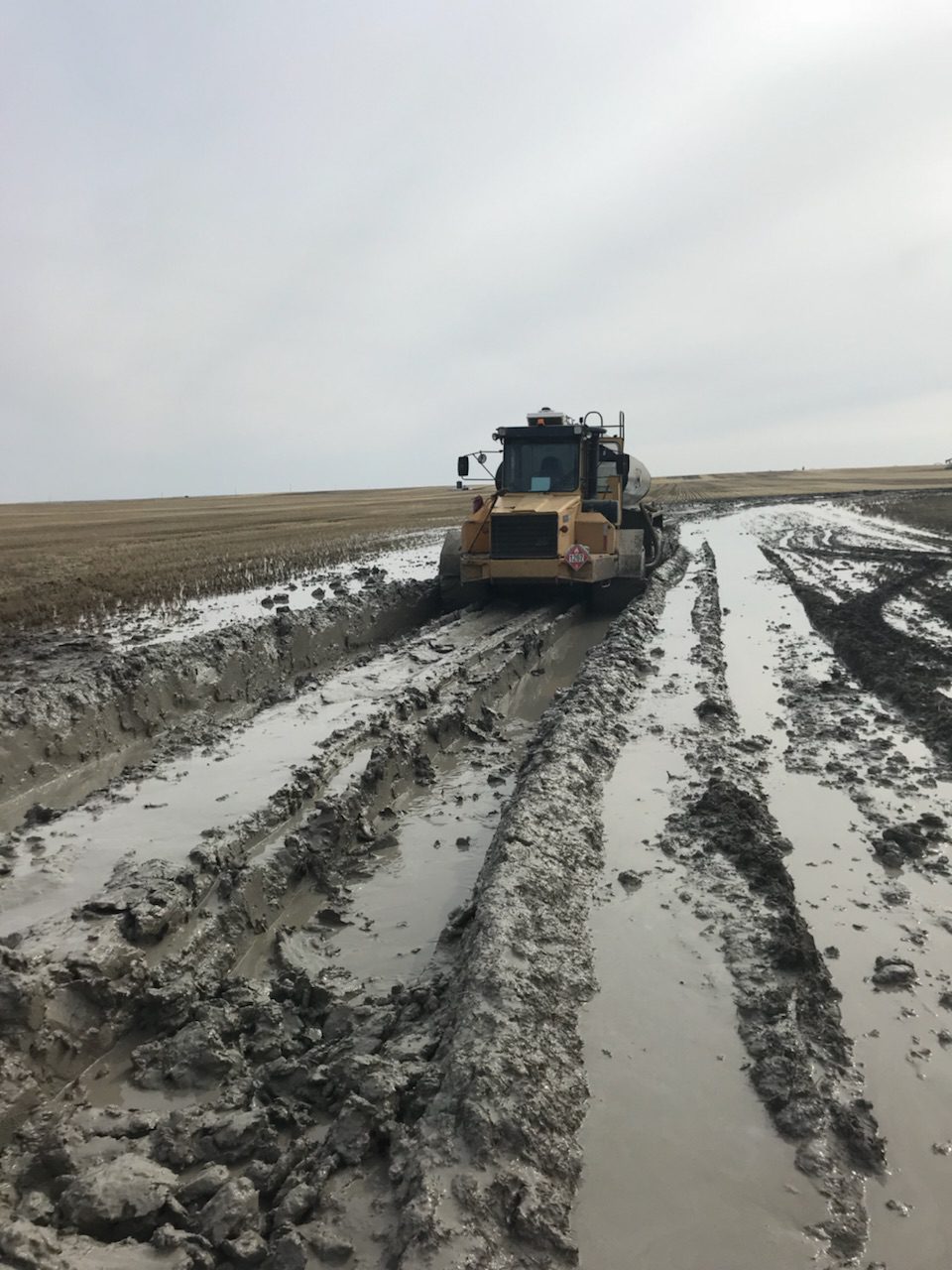 Shmittys mud buggie driving through muddy field
