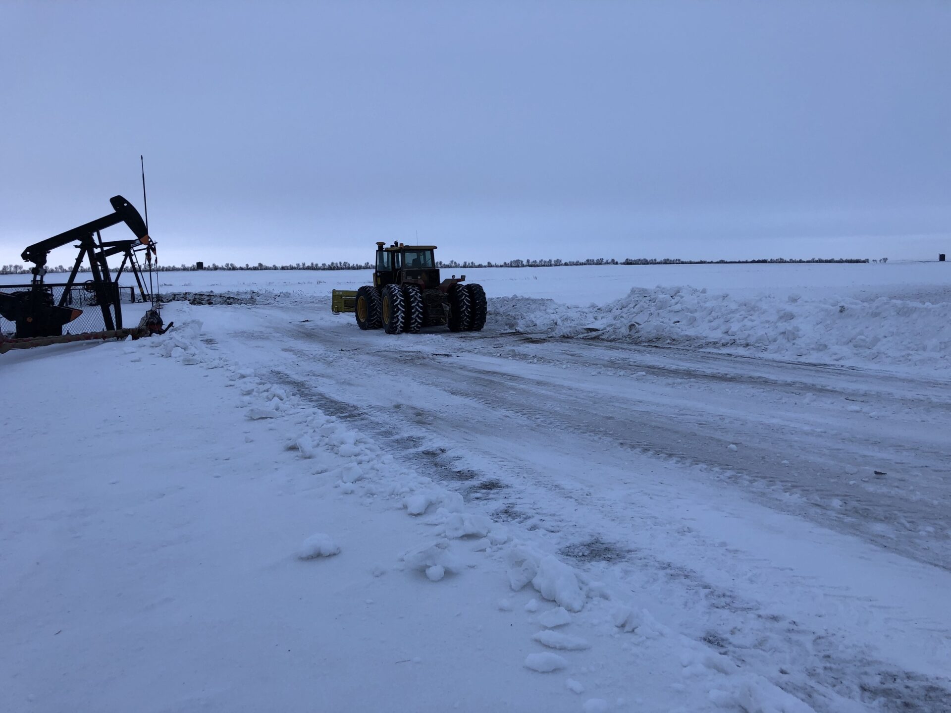 Tractor removing snow on site